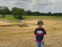 2007 Jack Strawhacker's grandson, Trenton plays by pond site