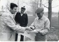 1980 Norman Berg meets with others
