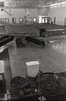 Room with chairs and agricultural equipment