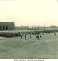 Soldiers lined up near football stadium, The University of Iowa, 1950s