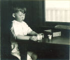 Boy with cups, The University of Iowa, 1920s