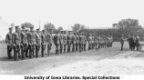 Governor N.E. Kendall presenting awards to cadets on Iowa Field, The University of Iowa, May 10, 1924