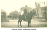 Man on horseback for Homecoming parade, The University of Iowa, 1917