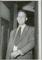 George F. Stewart walking through a doorway