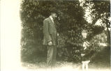 Man and child wearing hats regarding each other, Marion, Iowa, December 1909