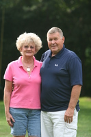 Unidentified couple with windbreak background