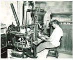 Man operating linograph machine, The University of Iowa, 1950s