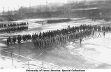 Cadets stacking arms on Iowa Field, The University of Iowa, 1918
