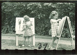 Girls painting pictures outside, The University of Iowa, 1940s