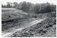 1970s Earthmoving machinery in field