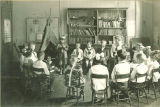 Classroom program with students in Native American costume, The University of Iowa, 1919
