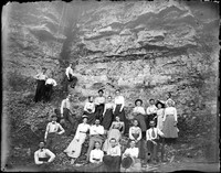 UP673 Twenty three people by rock face