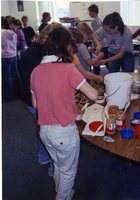 Students make pine cone bird feeders