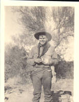 Unknown man wearing cowboy outfit