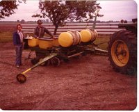 Loren Cassel and Bill Smith Stand by Planter