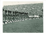University of Iowa Scottish Highlanders performance at football game, 1950s?