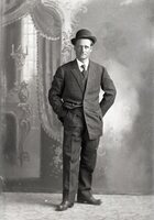 Man standing with hat