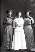 Three women standing
