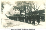Graduation procession on Washington St. with Engineering Building in background, The University of Iowa, June 1914