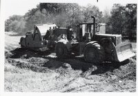 1970s Earthmoving machinery in field