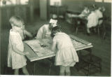 School children quilting, The University of Iowa elementary school, April 1931