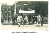 Men wearing barrels in Mecca Day parade, The University of Iowa, 1920