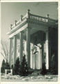 Front porch of the university president's house in winter, The University of Iowa, 1930s