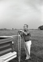 Oren Champ and survey equipment
