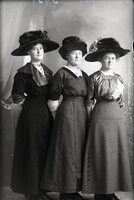 Three women in hats