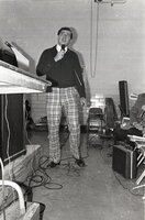 1976  Men at microphone 