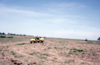 Photograph Collection Of A Man On A Tractor 