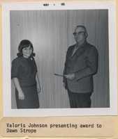 Valoris Johnson Presenting an Award to Dawn Strope.
