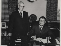 Men Sign Agreement.