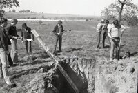 1970s FFA students work on a project around a ditch