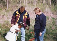 2002  Soil Conservationist Troy Deutmeyer helps girl scouts plant trees