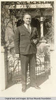 Milton Kirch in suit with pipe