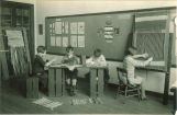 Second and third graders in weaving class, The University of Iowa elementary school, February 1929