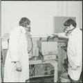 Researchers in respiration masks, 1978