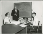 Gaylord Worden, Earl O. Heady, and  Leroy Blakeslee of the Center for Agricultural and Economic Development, 1966.