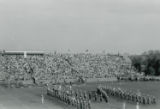 Iowa State University marching band performs at the Homecoming football game, 1952