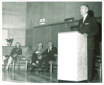 Gov. Leo Hoegh speaking in Shambaugh Auditorium for Philip D. Sang exhibition, The University of Iowa, 1956