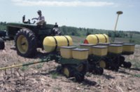 Photograph Collection Of A Man On A Tractor 