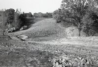 1970s Earthmoving machinery in field