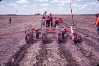 An Aurelia FFA group watch a demonstration of a no-till planter in action. 