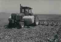 Tractor and Plowed Field