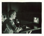 Students working with projector in engineering laboratory, The University of Iowa, 1939
