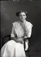 Woman seated in chair