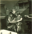 Woman reading to small girls, The University of Iowa, January 12, 1938