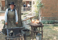 Blacksmith in Museum of Amana History yard, Amana, Iowa, June 1988