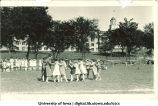Physical education instruction student teaching children near the Pentacrest, The University of Iowa, 1920s